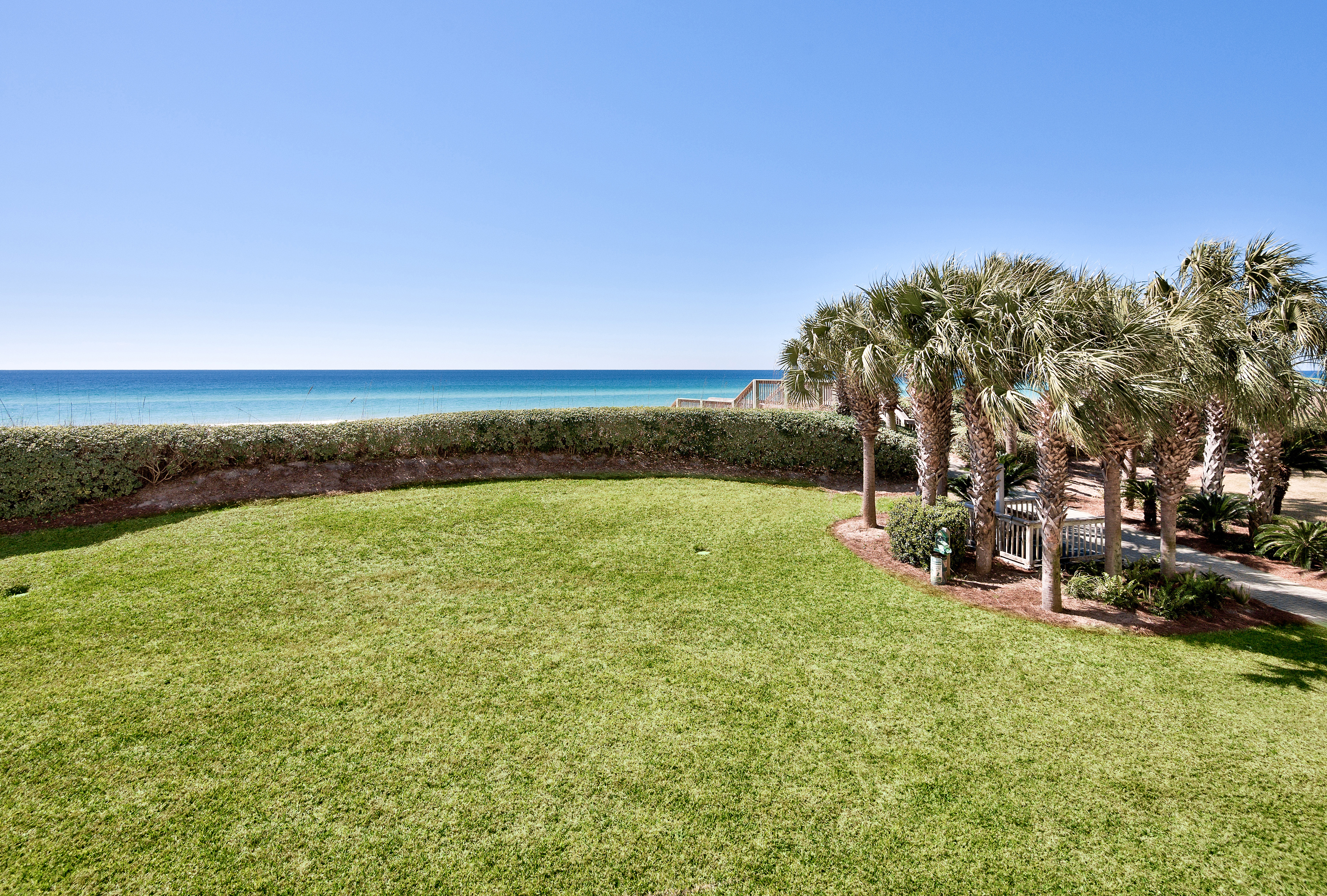 The landscaped lawn of one of Destin's Gulf front homes